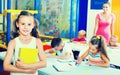 Portrait pupil girl studying in school class