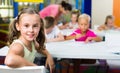 Portrait pupil girl studying in school class