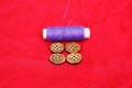 Portrait of purple Sewing thread and button Royalty Free Stock Photo