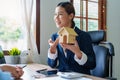 Portrait of a real estate agent or bank officer, the lending department quotes the interest on the loan to the customer