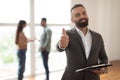 Portrait Of Real Estate Agent Showing Thumbs Up Like Gesture Royalty Free Stock Photo