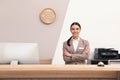 Portrait of receptionist at desk in hotel Royalty Free Stock Photo