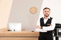 Portrait of receptionist near desk in hotel Royalty Free Stock Photo