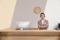 Portrait of receptionist working at desk Royalty Free Stock Photo