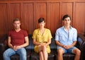 Portrait, recruitment and bored people waiting on a sofa in an office for a human resources interview. Business, hiring Royalty Free Stock Photo