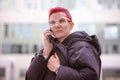 Portrait of red-haired woman talking on the phone Royalty Free Stock Photo