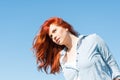 Portrait of redhead girl relaxing on sunny day Royalty Free Stock Photo