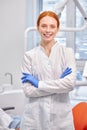 Portrait Of Redhead professional Dentist Orthodontist Posing At Camera At Work Place Royalty Free Stock Photo