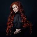 Portrait of redhead woman with long hair on black backgroun Royalty Free Stock Photo