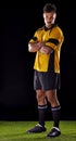 Portrait, referee or man with arms crossed in sports game on turf ready for warning, foul call or football. Soccer match