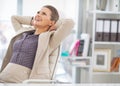 Portrait of relaxed business woman in office Royalty Free Stock Photo