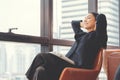 Portrait of relaxed business woman in office. Relax and freedom concept Royalty Free Stock Photo