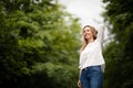 Portrait of a relaxed middle aged woman outdoors Royalty Free Stock Photo