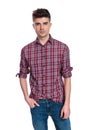 Portrait of relaxed young man wearing a shirt with plaids