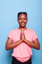 Portrait of religious african american teenager praying to god asking for gratitude