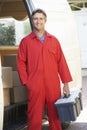 Portrait Of Repairman Arriving In Van Royalty Free Stock Photo