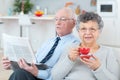 Portrait retired couple in home