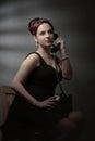 Portrait in retro style with old black phone Royalty Free Stock Photo