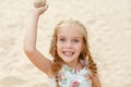 Portrait risible blonde girl with pigtails and blue round eyes