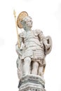 Portrait of Roman warrior old sculpture as a saint at the dome roof of Basilica San Marco in Venice, Italy, isolated at white