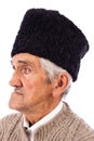 Portrait of a romanian old peasant with old fashion Astrakhan ha