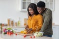 Portrait Of Romantic African American Couple In Kitchen Cooking Lunch Together Royalty Free Stock Photo