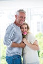 Portrait of romantic mature couple with pink rose Royalty Free Stock Photo