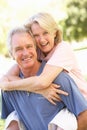 Portrait Of Romantic Senior Couple In Park Royalty Free Stock Photo