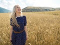 Portrait of romantic woman running across field Royalty Free Stock Photo