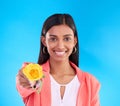 Portrait, rose and valentines day with a woman on a blue background in studio for love or romance. Face, happy and smile