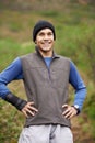 Portrait, runner or happy man in forest ready for a workout, exercise or fitness training in park, woods or nature