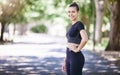 Portrait, runner or happy woman ready for fitness workout or body movement while relaxing on break. Resting, tired