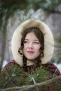 Portrait russian girl smile in national kerchief and fur coat on