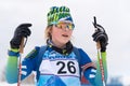 Portrait of Russian sportswoman biathlete Anastasia Legostaeva after skiing, rifle shooting. Junior biathlon