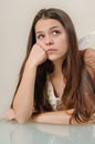 Portrait of sad angel girl looking up and thinking with sorrow Royalty Free Stock Photo