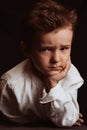 portrait of a sad angry child preschooler boy