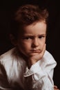 portrait of a sad angry child preschooler boy