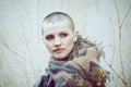 Portrait of sad beautiful Caucasian white young bald girl woman with shaved hair head in leather jacket Royalty Free Stock Photo