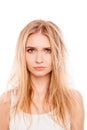 Portrait of sad blonde woman with dry damaged hair Royalty Free Stock Photo