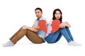 Portrait of sad couple holding broken heart pieces Royalty Free Stock Photo