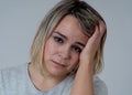 Portrait of sad depressed woman having headache and emotional pain. In Health and Human expressions Royalty Free Stock Photo