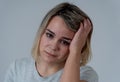 Portrait of sad depressed woman having headache and emotional pain. In Health and Human expressions Royalty Free Stock Photo