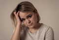 Portrait of sad depressed woman having headache and emotional pain. In Health and Human expressions Royalty Free Stock Photo