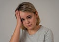 Portrait of sad depressed woman having headache and emotional pain. In Health and Human expressions Royalty Free Stock Photo