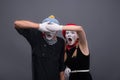 Portrait of sad mime couple crying isolated on