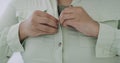 Portrait of sad plus size woman struggling to button up shirt. Closeup of overweight latino woman feeling unhappy with