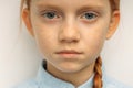 Portrait of sad red haired girl isolated over yellow background Royalty Free Stock Photo