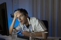 Portrait sad unhappy health care professional with headache stressed during night shift. Nurse doctor with migraine overworked Royalty Free Stock Photo