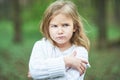 Portrait of sad unhappy little girl. Little sad child is lonesome. upset and distraught angry facial expression. Royalty Free Stock Photo