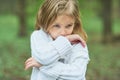 Portrait of sad unhappy little girl. Little sad child is lonesome. upset and distraught angry facial expression. Royalty Free Stock Photo